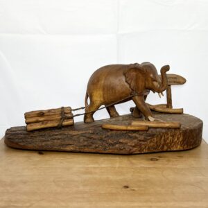Wooden Elephant Pulling Logs